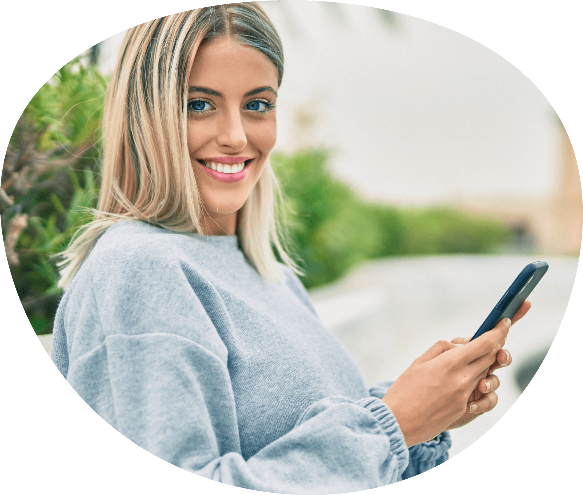 woman with phone smiling